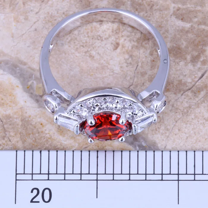 Великолепное женское серебряное кольцо с красным гранатом и белым кубическим