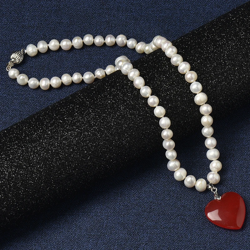 

The 8-9 mm Freshwater Natural Pearl Necklace with Romantic and lovely pure red heart-shaped 25*25*6 mm pendant and Tiny Fine
