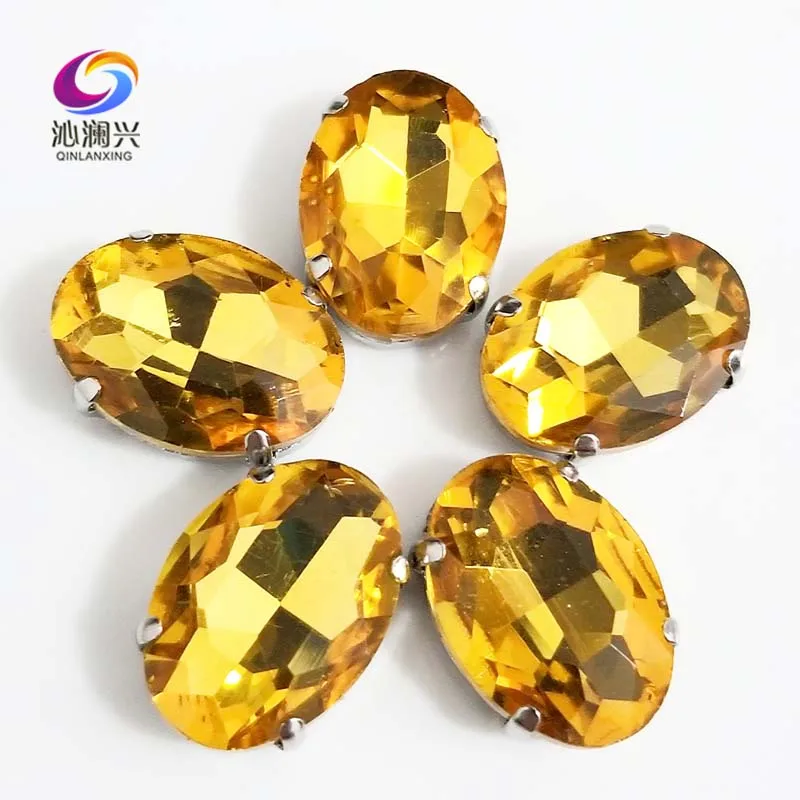 

Golden yellow oval shape High quality Glass Crystal flatback sew on claw rhinestones with holes,Diy/Clothing accessories SWT19