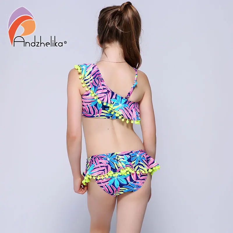 Andzelika bikini бикини для девочки. Раздельный яркий купальник с топом на одно плече с рюшами и плавки с юбкой