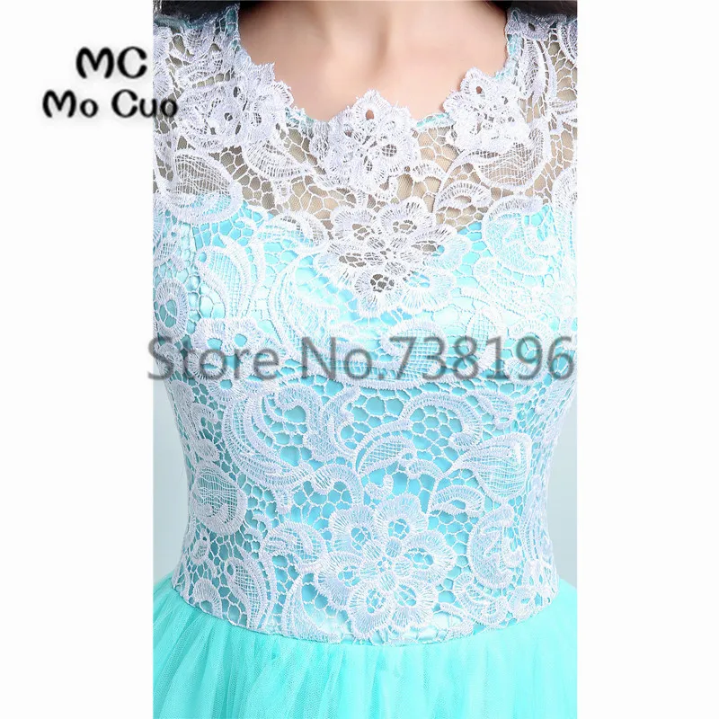 Женское вечернее платье с кружевом длинное темно синее аппликацией на пуговицах