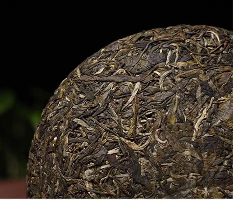 Год Mingfeng горный Древний дерево Pu-erh сырой Pu-erh 357 г Sheng Pu-erh