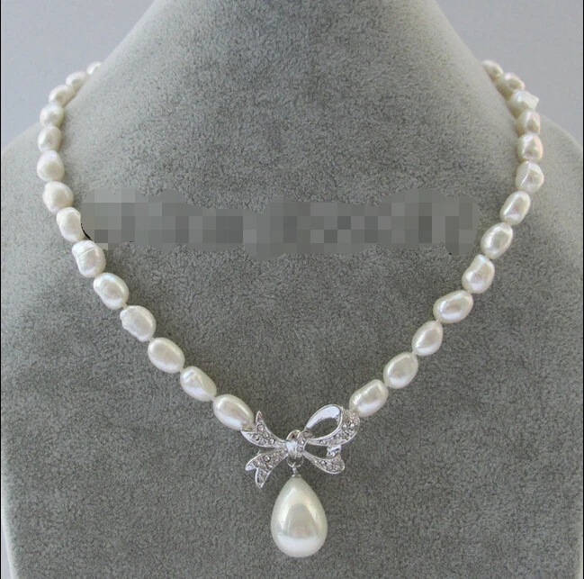 

FREE shipping>>> >>> 17 " 9-12mm white baroque freshwater pearl necklace + butterfly 20mm shell pearl 6.07 6.08