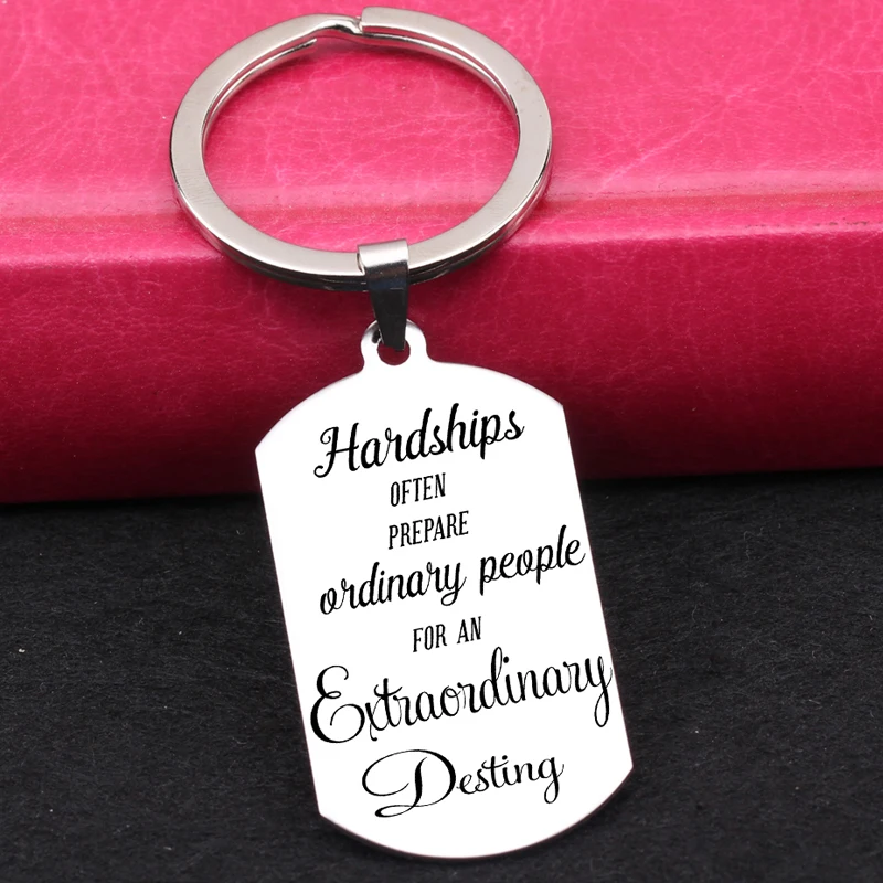 Модный брелок с гравировкой тяготы часто готовят обычных людей к необычайному