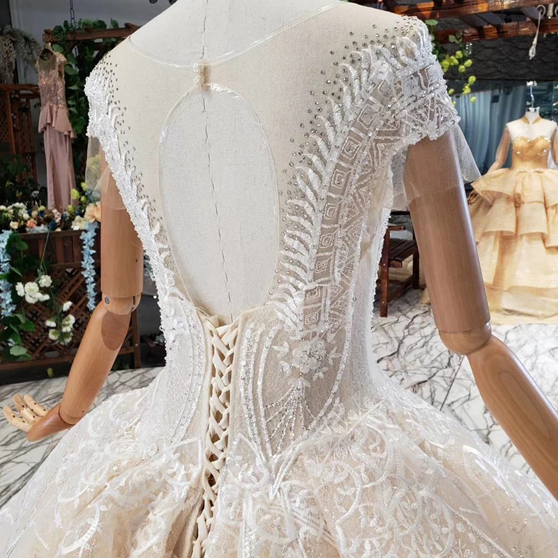 

HTL585 light champagne tiered wedding dresses with rain cap sleeve o-neck beading wedding gowns 2020 vestido para casamento