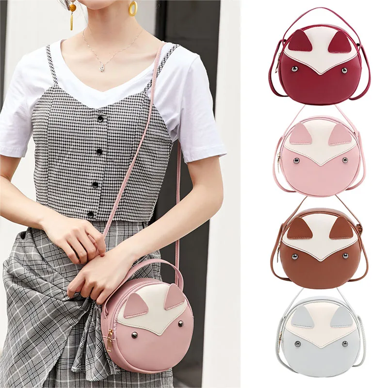 Женская сумка на одно плечо контрастных цветов круглая полиуретановая молнии с