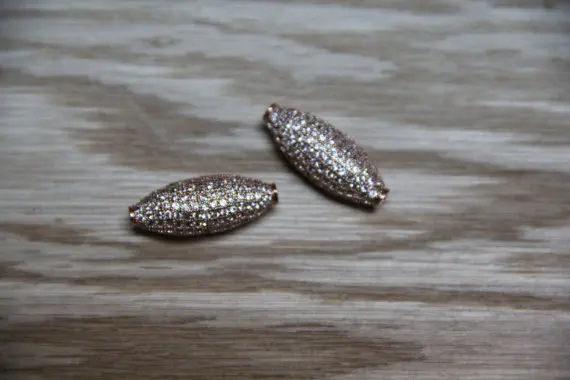 

CZ Micro Pave 11x28mm Long Oval Beads