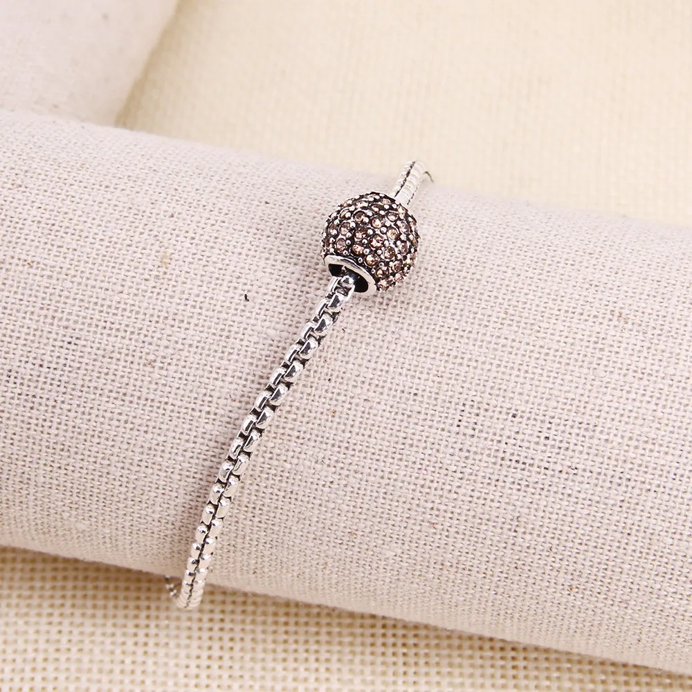 Браслет Thomas Full цвета шампанского с фианитами украшенный бусинами подходит для