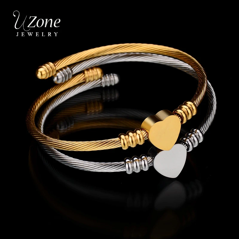 Браслет из нержавеющей стали золотистого цвета с закрученными сердечками для