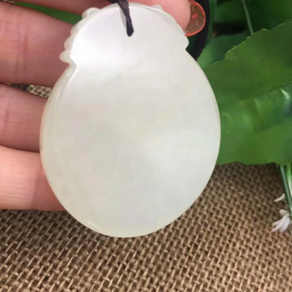 

Hetian jade carved auspicious (Rooster) Circle Pendant