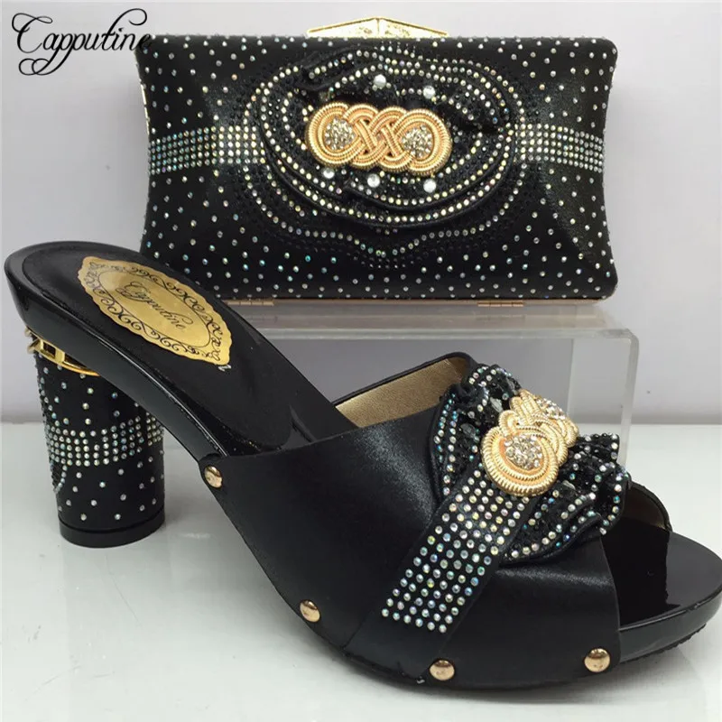 Новейший комплект из обуви и сумки искусственной кожи с камнями в африканском