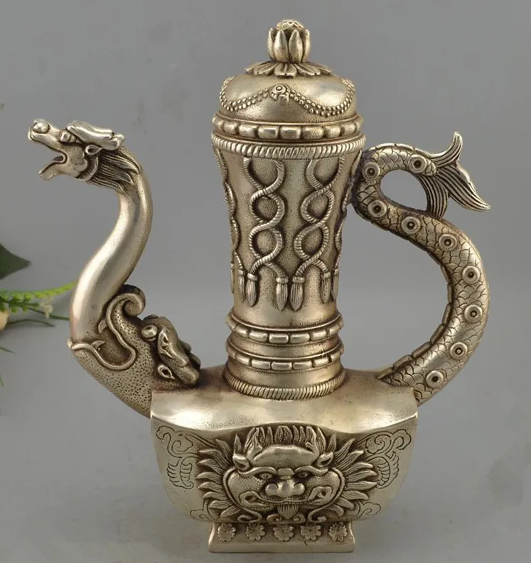 

Китайский древний Тибет серебро ручной работы Резьба Дракон Чайник-скульптура