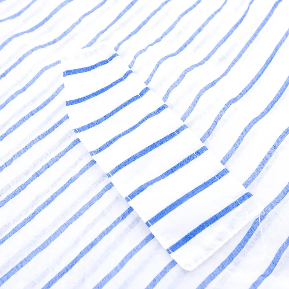 2018 summer new Harajuku fashion lapel impact coloring vertical stripe perspective long sleeved shirt. |