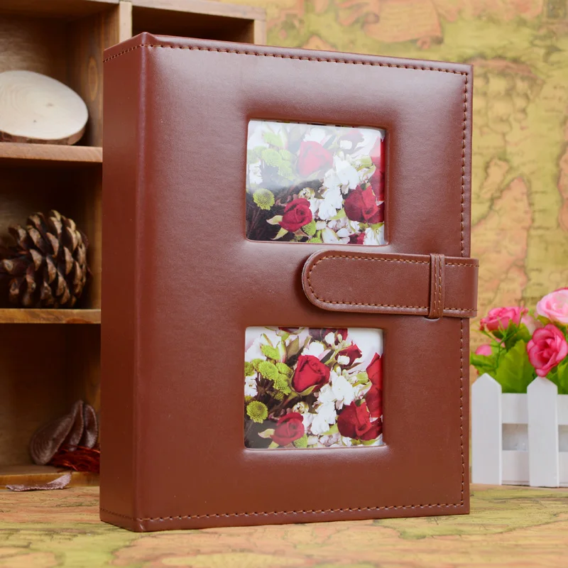 Фотоальбом с кожаным покрытием "Хай-энд", междустраничный, размером 4R (15,2 х 10,2 см), 200 карманов для фотографий, для детей и семьи, с пряжкой.
