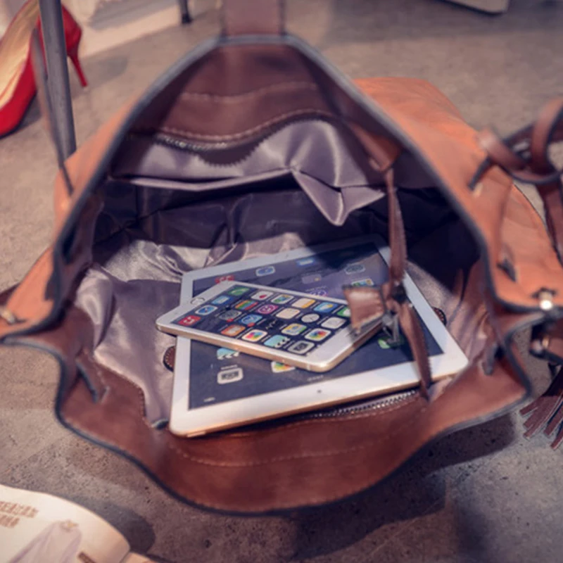 Женская сумка женские кожаные сумки сумка-мешок большой емкости с кисточками