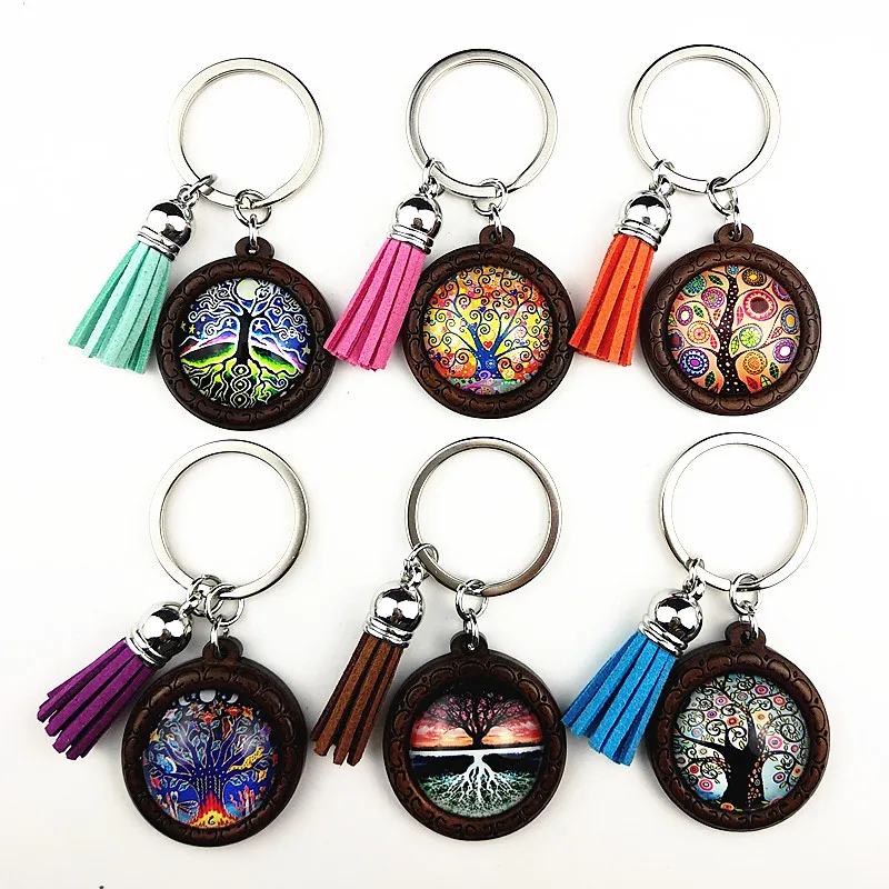 

Jiangzimei 24pcs Tree of Life Keyring 25mm Wood Cabochon Stainless Steel Keychain with tassels glass Cabochon Wholesale