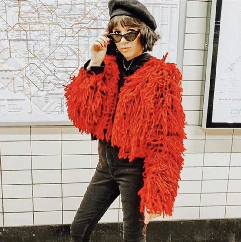 Однотонные женские вязаные кардиганы с кисточками 2018 осенние повседневные