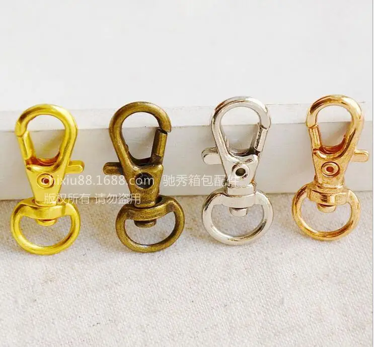 

2018 100pcs Vintage Metal Luggage bag Dog buckle Snap hook,Bag hanger Lobster Clasp DIY Sewing handmade Key chain buttons AU179