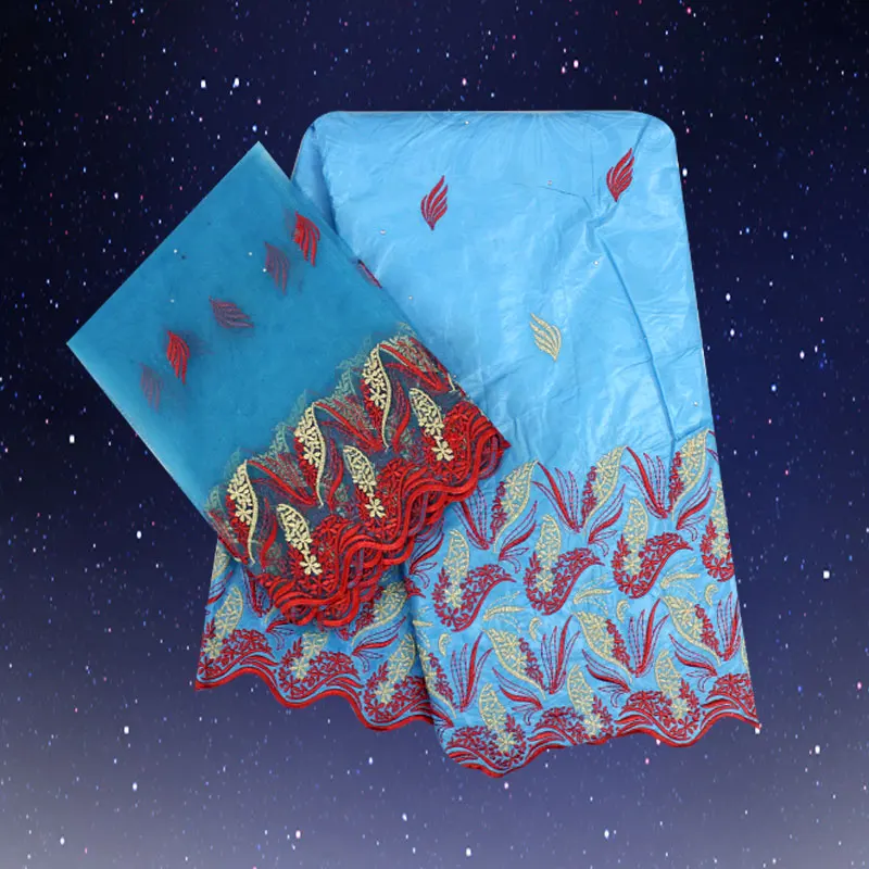 Красивое женское платье небесно-голубого цвета в африканском стиле Базен риче Getz