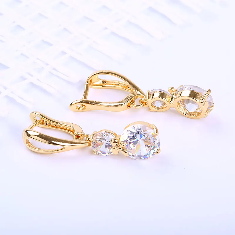 Женские серьги обручи с бантом и фианитом ER0122|fashion hoop earrings|hoop earringscz earrings |