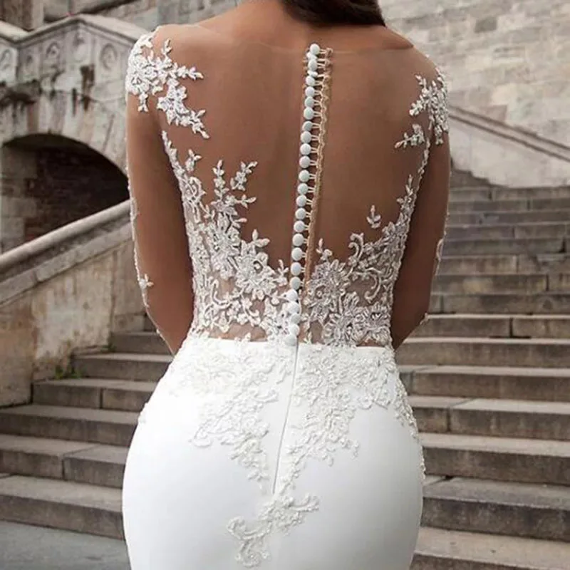 

Crepe Wedding Dress with Illusion Long Sleeve Lace Appliqued Beaded Bridal Gown