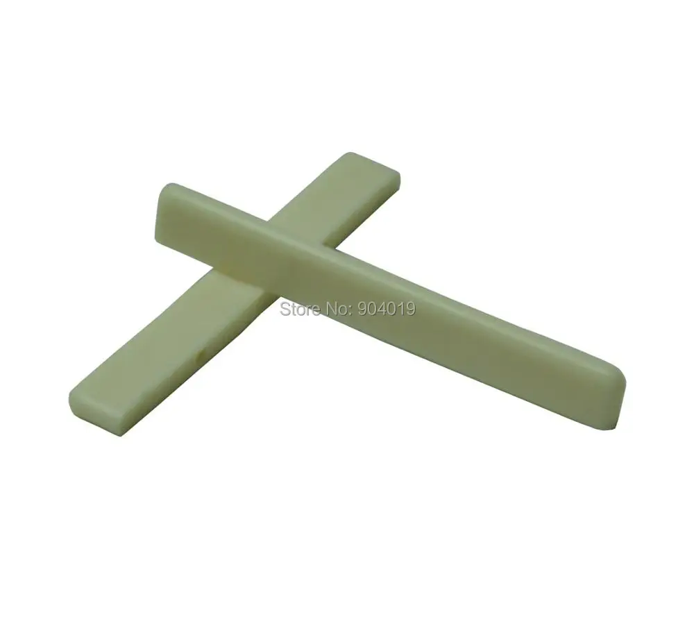 

50pcs Universal Ukulele Bridge Lower Nut Saddles Plastic Ivory White