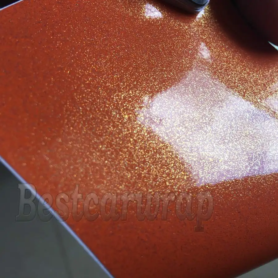 Глянцевая блестящая виниловая переключатель оранжевого и золотого цвета для