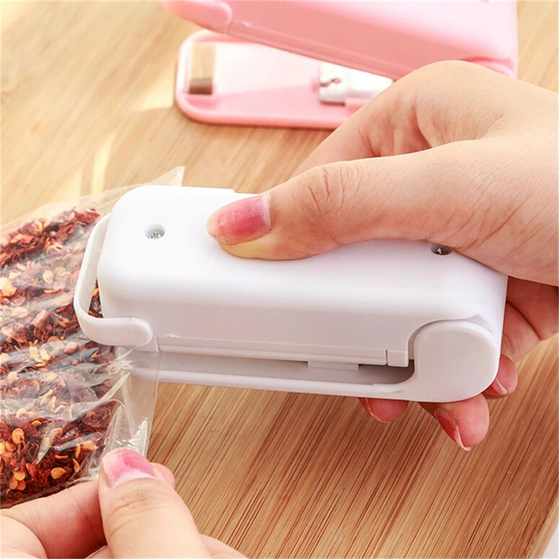 

Portable 1Pcs Mini Household Sealing Machine Sealer Food Saver Plastic Bag Capper Hand Pressure Hot Sealer Without Battery