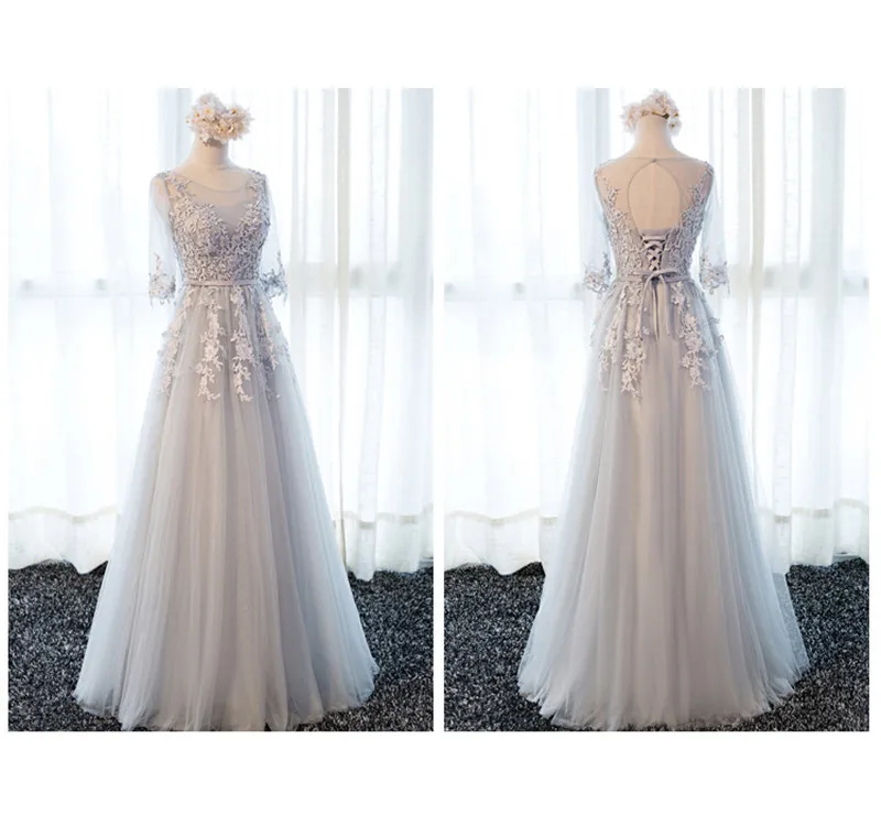 Женское вечернее платье А силуэта серебристо серое со шлейфом и рукавом до локтя