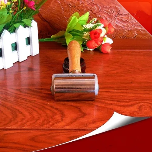 

DIY handmade leather cow leather carving tool iron wheel binder pressure side iron roller 560g
