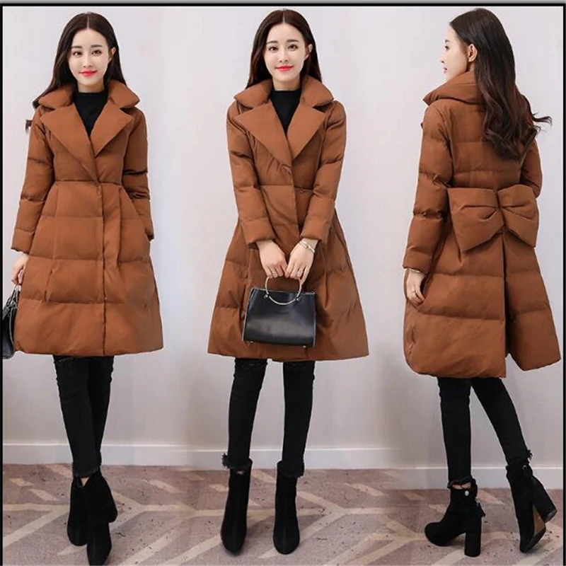 Женская куртка средней длины приталенная стеганая трапециевидной формы с