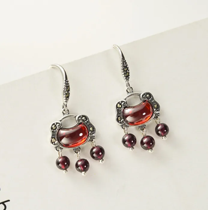 

KJJEAXCMY Fine Jewelry 925 Sterling Silver Inlaid Garnet Tassel Female Longevity Lock Earrings