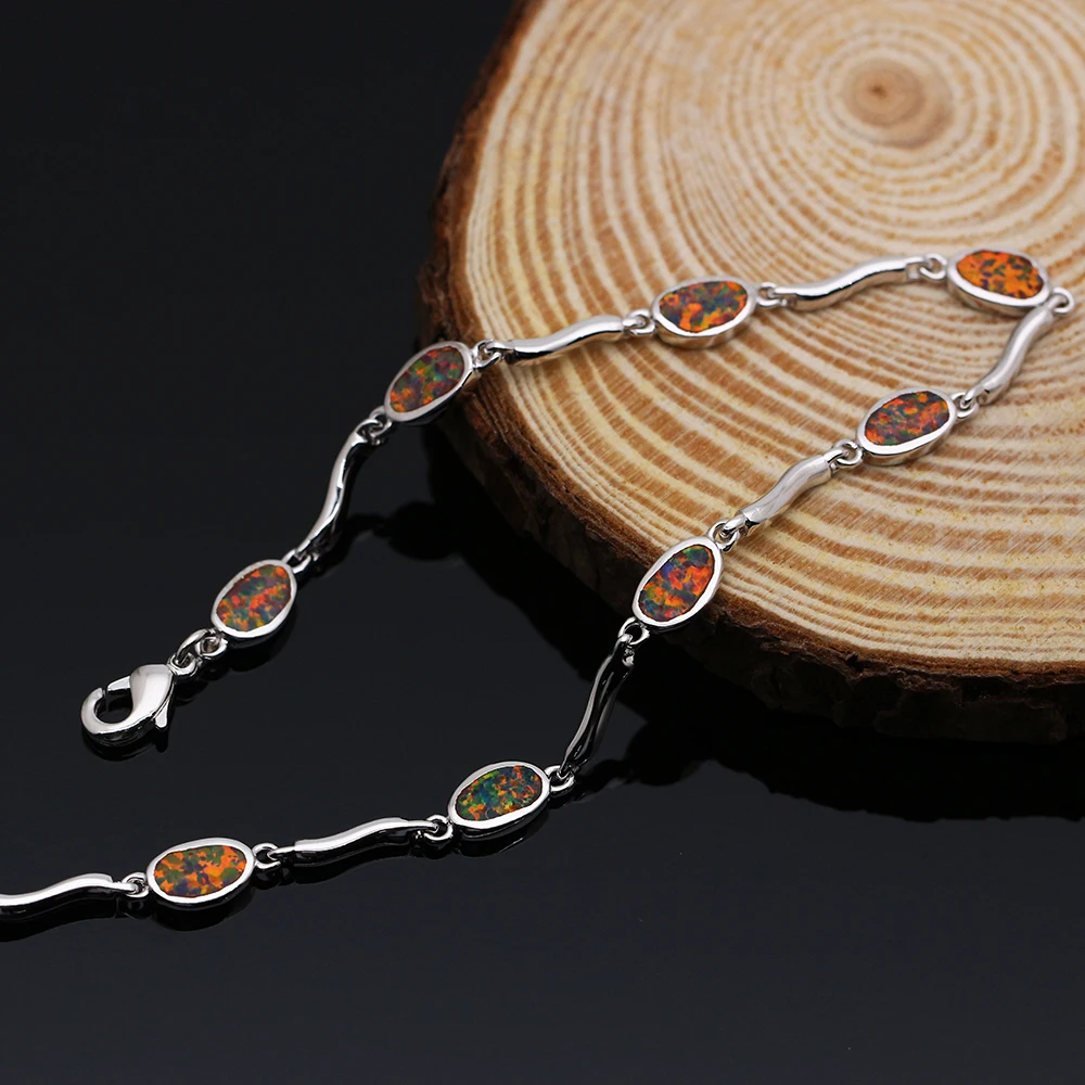 Браслеты женские посеребренные с синим и коричневым огненным опалом SL208 |