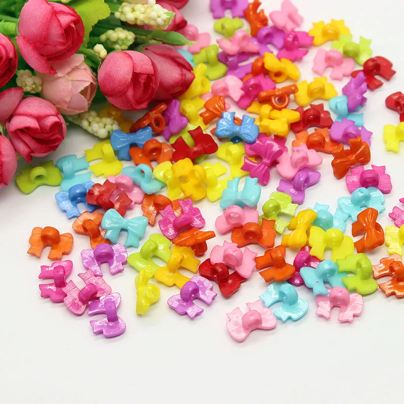 

100pcs Mixed color Butterflyplastic button baby sewing button decoration / sewing / craft / scrapbook accessories