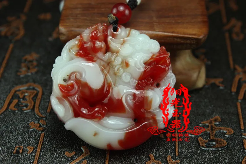 

Xinjiang Chicken Blood Stone Pendant
