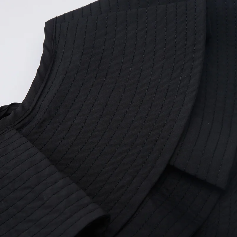 Черная блузка с бантом спереди и вырезами оборками завязками на талии баской 2019