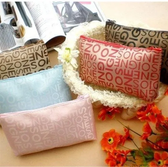 20 pieces new lowest price letter portable cosmetic bag travel wash multi purpose/functions free postage