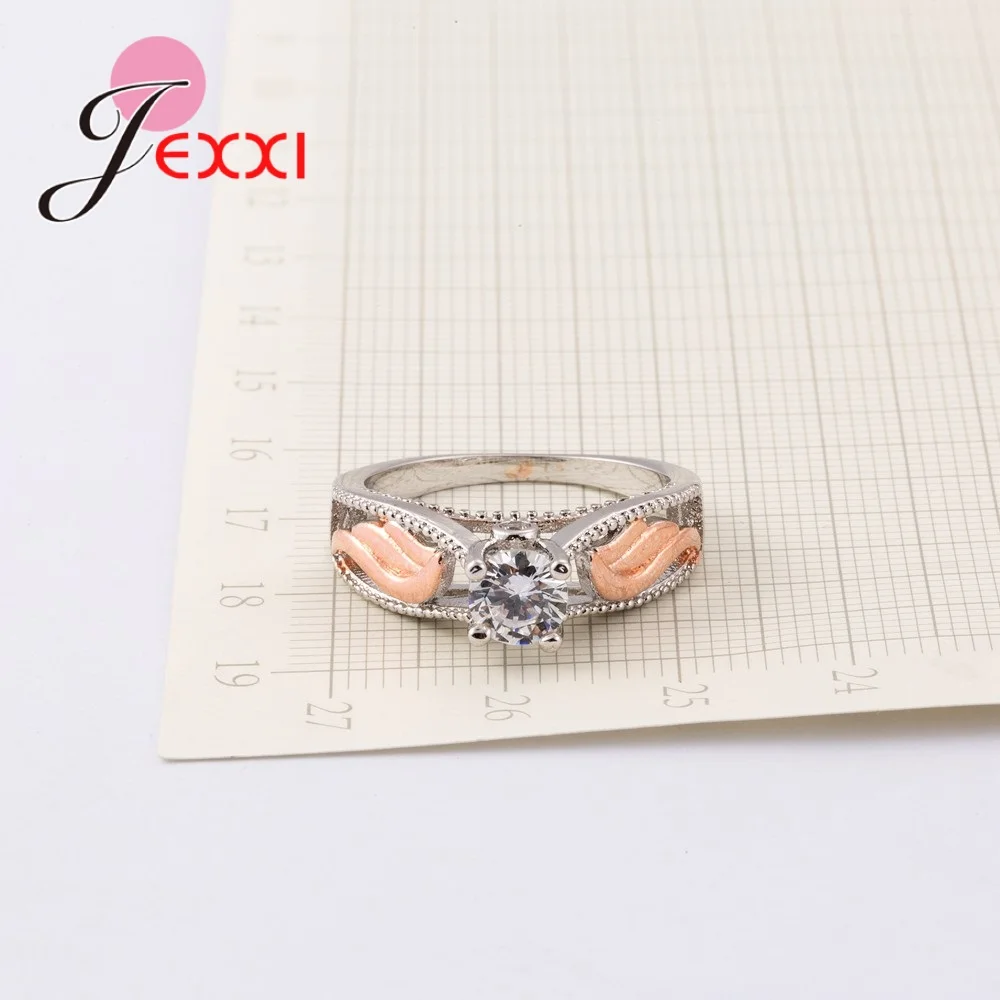 Фирменные красивые кольца из серебра 925 пробы с фианитом и крыльями розового