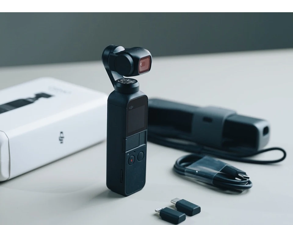 DJI Osmo карман как самый маленький 3-осевая стабилизированная для цифровой зеркальной камеры DJI никогда не разработаны, компактный и интеллигентая(ый) Osmo карман