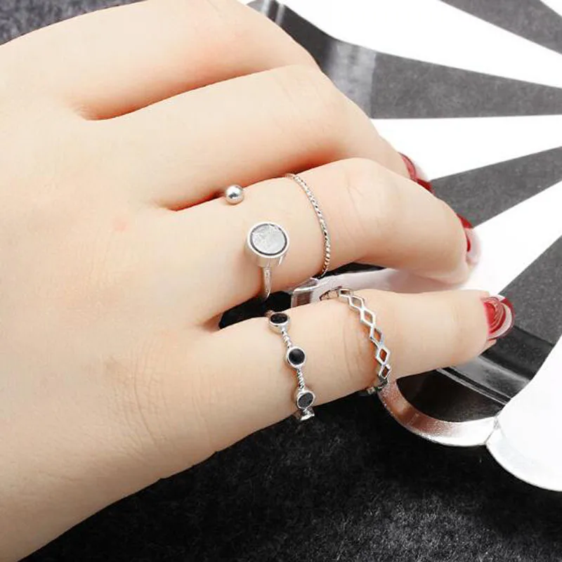 

Xuben 4 pc/set Black beads water ripples open silver color ring simple wind four piece combination tail ring