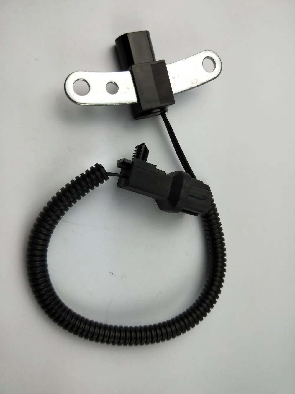 Датчик положения коленчатого вала SMD для Jeep Cherokee 53009954 4638128 56027866AB PC130 CSS814 04638128 53006154 |