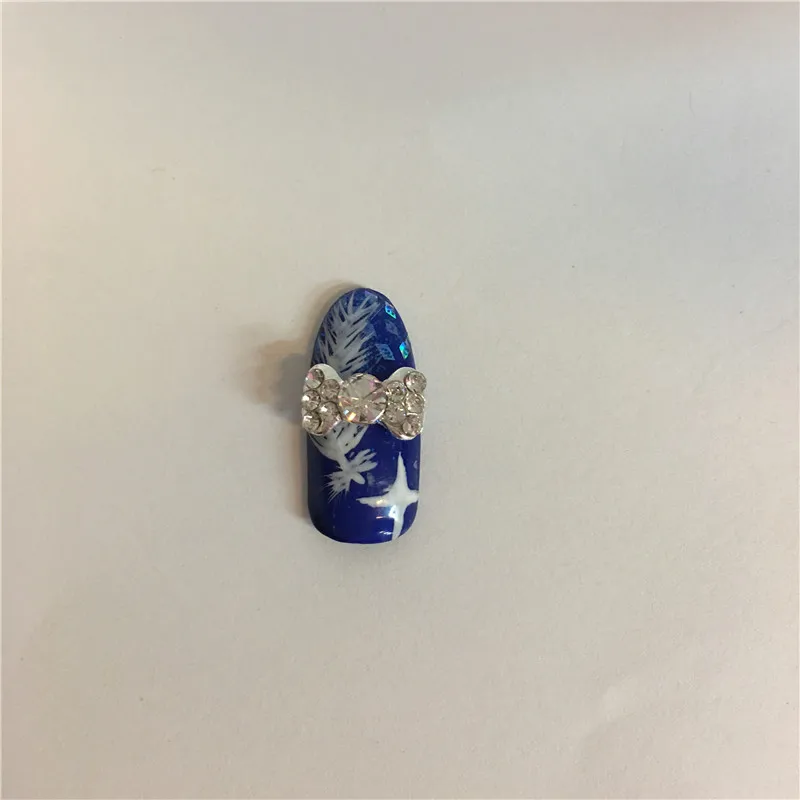 

10 Pcs/bag Nail Alloy Jewelry Silver New Bow Paste The Crystal Nail Manufacturers supply 3DNail Art Decoration Tools StickersH12