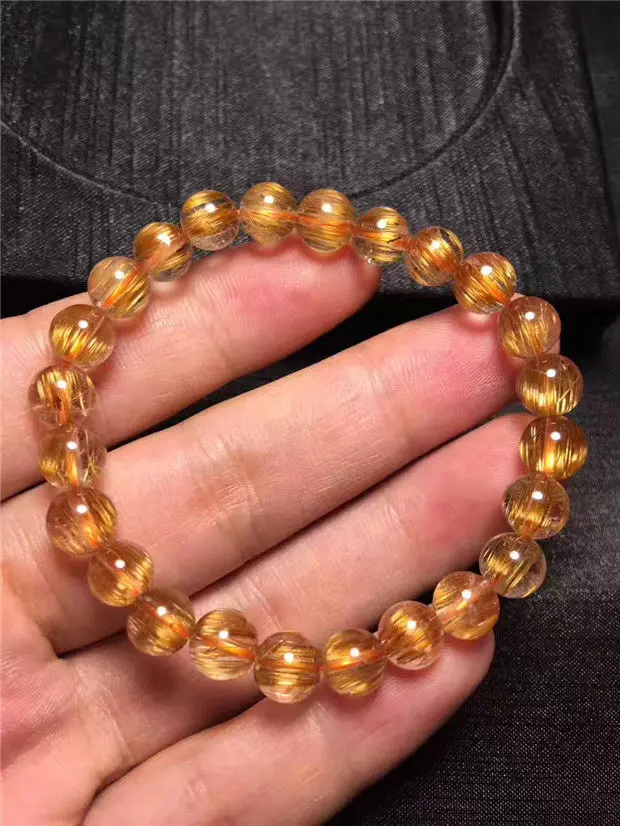 

Natural Gold Titanium Rutilated Quart Beads Power Bracelet AAAA 7.3mm