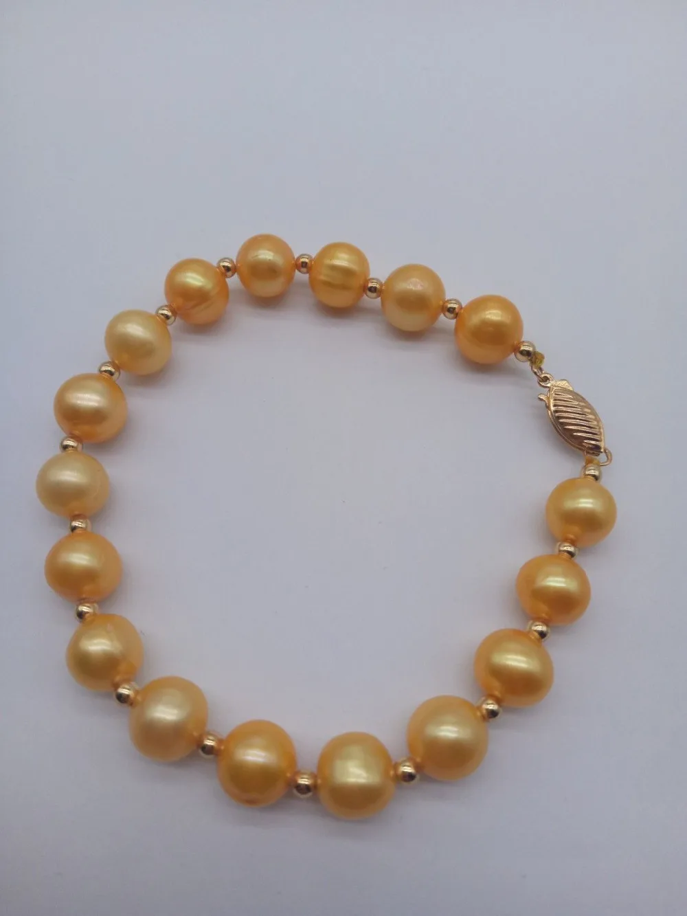 

NATURAL AAA 9-10mm GOLDEN SOUTH SEA PEARL BRACELET 7.5-8''