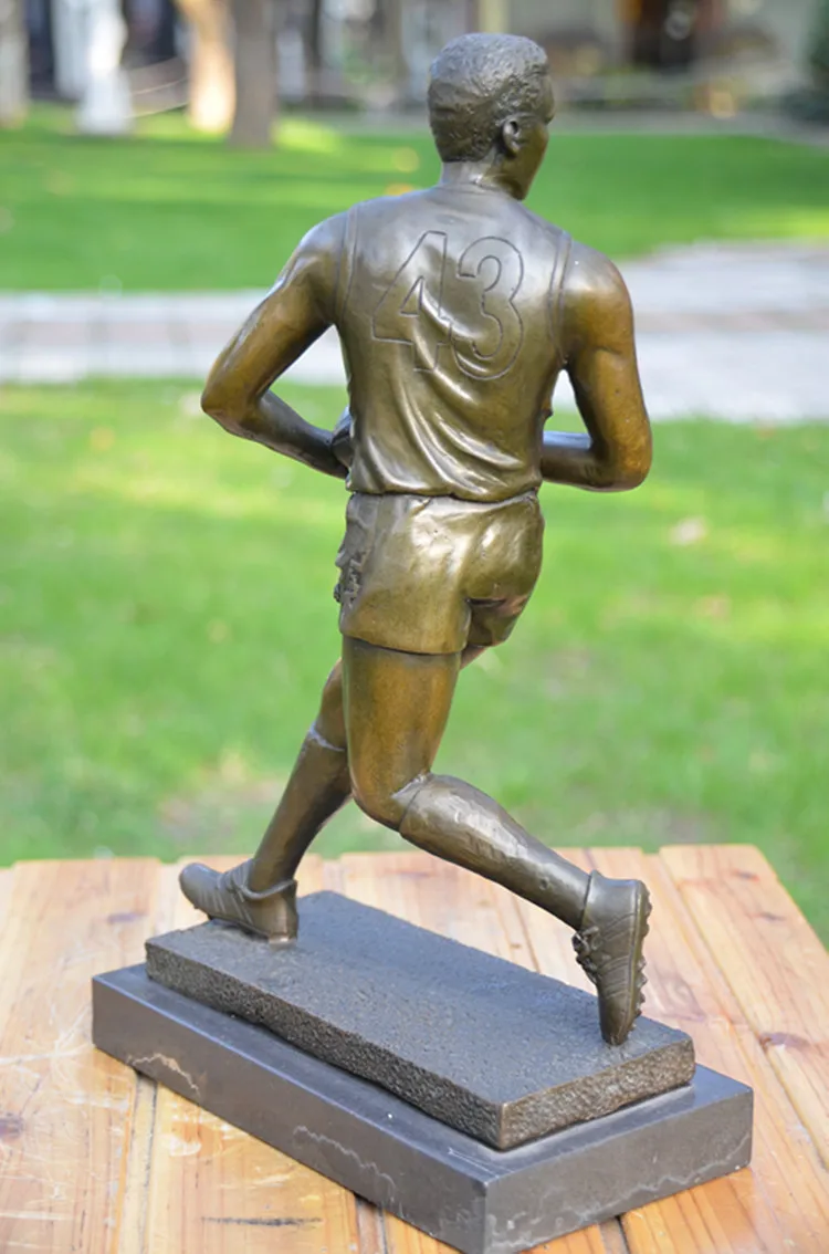 

Copper sculpture figures ornaments rugby ball sports sports art jewelry gift hotel decoration