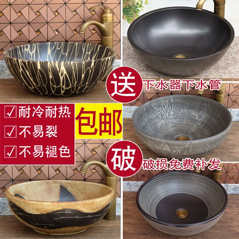 Средиземноморский круглый стол черный умывальник ванная комната керамический