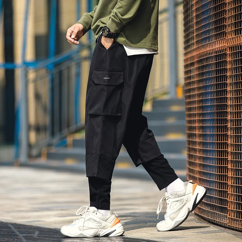 Новинка осени 2019 модные мужские брюки имитация двух частей черные длина по