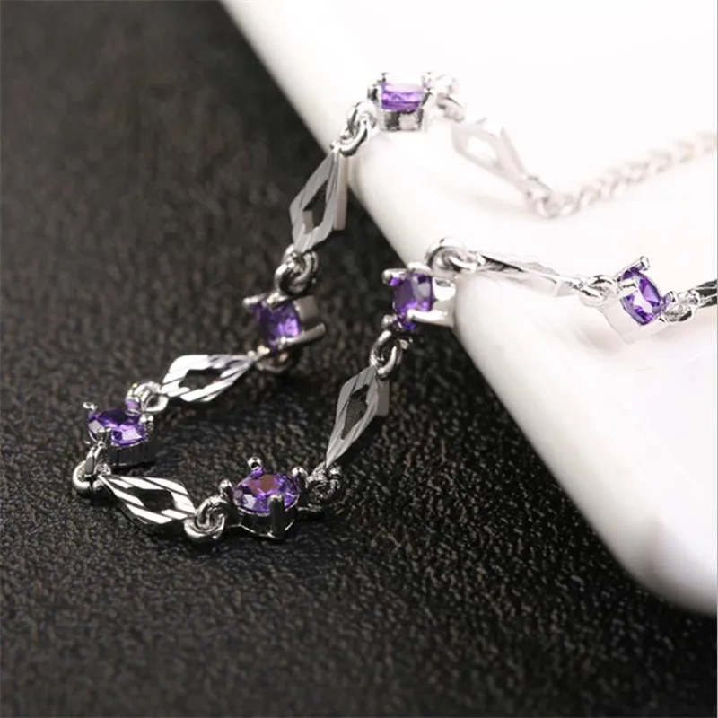 Женский браслет из серебра 925 пробы с фиолетовыми кристаллами - купить по
