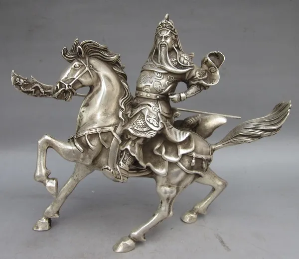 

Elaborate Chinese Characteristics handmade Tibetan silver statue of warrior god Guan Yu Riding