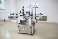 t 21200 automatic positioning vertical round bottle labeling machine